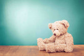 Bear Plush Toy On Wood Floor With Pale Turquoise Wall Backdrop Shopbackdrop